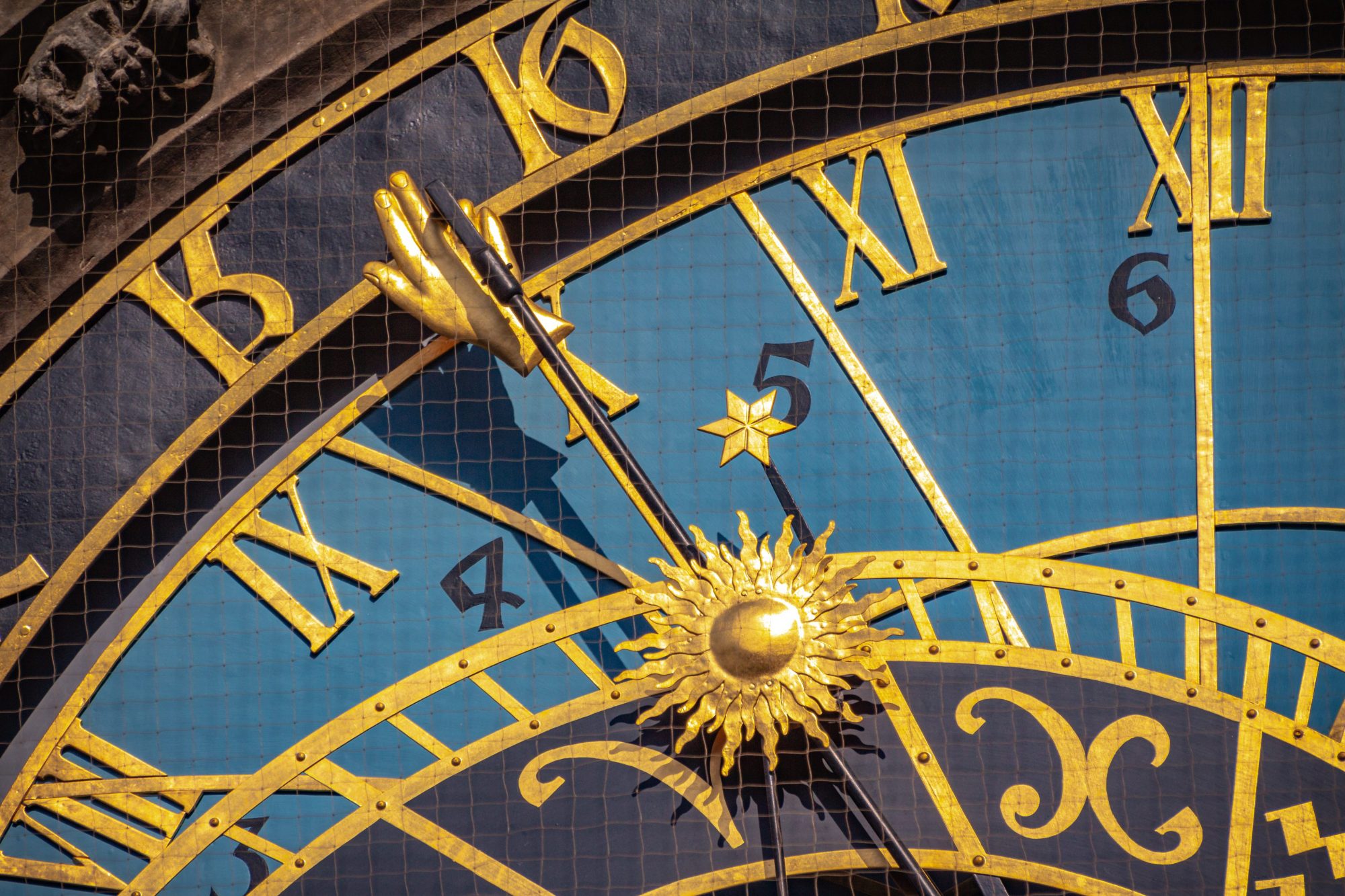 Astronomical Clock, detail of the golden hand and numbers